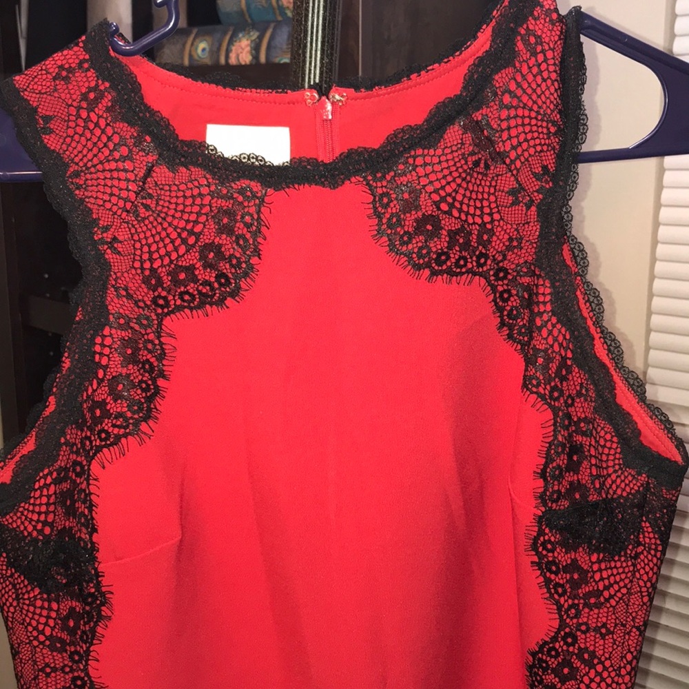 Donna Morgan red dress with black lace details.